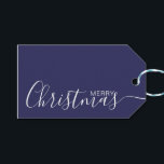 Merry Christmas Navy Blue White Minimalist Gift Tags<br><div class="desc">This minimalist and elegant gift tag features white Merry Christmas text on the front side and on the back side personalise it with your name or family name. The background is in navy blue colour.</div>