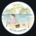 Merry Christmas on the Beach Family Name  Classic Round Sticker<br><div class="desc">Doesn't this tell a great story -- it is still a Merry Christmas on the beach moment -- whether you are actually on the beach or might like to imagine that you are -- this artistic watercolor sticker will take you there. Enjoy and it would make a really fun and...</div>