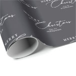 Merry Christmas Personalised Modern Elegant Script Wrapping Paper<br><div class="desc">This custom Christmas wrapping paper features a stylish, modern design with elegant script text on a blueish charcoal grey background. Featuring "Merry Christmas" and your family name, it's perfect for adding a sophisticated, personal touch to your holiday gifts. The minimalist, chic look makes it ideal for any festive occasion, whether...</div>