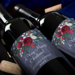 Merry Christmas red floral navy barn family name Wine Label<br><div class="desc">Celebrate this Christmas with an elegant personalised labelled wine with your custom text featuring a traditional seasonal bouquet with red and white peonies,  fir boughs,  and green foliage over a rustic country navy barn wood with string lights.</div>