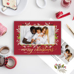 Merry Christmas Red Gold Elegant Script Foil Holiday Card<br><div class="desc">"Merry Christmas" holiday card features a floral holiday greenery leaves and berries design with modern elegant real gold foil greeting text and frame around the picture. Personalize the simple text with a family signature and the year, and choose to include an additional message on the back of the card. Two...</div>