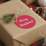 Merry Christmas Red & White Typography Festive Classic Round Sticker<br><div class="desc">Keep it simple with this festive red & white gift label sticker with Merry Christmas in white Typography / text. Or change it up by easily personalising it by changing the text. Change the colour with one more step by using the design editor tool! Stick them on Christmas cards, gifts...</div>