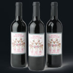 Merry Christmas Reindeer Personalised Name Wine Label<br><div class="desc">Merry Christmas Reindeer Personalised Name Festive Party Personalised Name Wine Labels Stickers features festive reindeer with pink bows and floral accents with the text "Merry Christmas" in modern pink calligraphy script typography with your personalised name. Perfect personalised gift for Christmas and the holidays for family and friends. Designed by ©2024...</div>