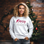 Merry Christmas Santa Hat Typography Sweatshirt<br><div class="desc">Celebrate the magic of the holiday season with our charming sweater! Adorned with a festive red and white hand-drawn Santa hat illustration resting atop a beautifully crafted brushstroke calligraphy font quote that reads "Merry Christmas, " this sweater captures the essence of joy and merriment. Wrap yourself in cosy comfort and...</div>