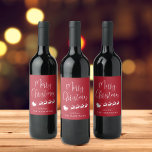 Merry Christmas Santas Sleigh Red Wine Label<br><div class="desc">Fun Christmas holiday red wine label featuring a silhouette of reindeers flying Santa's sleigh through air,  "Merry Christmas" in a modern white script and your name in simple white typography.</div>