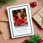 Merry Christmas simple blue wavy frame photo Holiday Card<br><div class="desc">With its cute wavy blue frame, this one-photo Christmas card is the perfect way to send holiday cheer. "Merry Christmas" in a fun script sits below a single vertical photo and pairs with your custom personalised text. This simple holiday card is great for families, couples and more. The back of...</div>