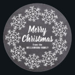 Merry Christmas Snowflake Chalkboard Personalised Classic Round Sticker<br><div class="desc">A large snowflake wreath creates a festive border on this chalkboard Christmas sticker. Merry Christmas is written in a bold white script font. Your name is just below in a classic sans serif white font. Easy-to-use template. Quickly add your own details. Use it to seal your Christmas card envelopes or...</div>