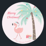 Merry Christmas  -  Sweet Tropical Santa Flamingo Classic Round Sticker<br><div class="desc">NewParkLane - Personalised Christmas Stickers,  featuring two a tropical scene with a cute pink flamingo wearing a Santa hat,  and a decorated palmtree with Christmas presents. 
Check out this collection for matching items! Do you have specific personal design wishes? Feel free to contact me!</div>