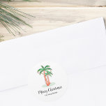Merry Christmas Tropical Palm Tree Classic Round Sticker<br><div class="desc">These Merry Christmas stickers are decorated with a tropical palm tree covered in lights and baubles.
Easily customisable.
Original Watercolor © Michele Davies.</div>