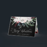Merry Christmas | Watercolor Flowers on Black Holiday Card<br><div class="desc">This beautiful holiday card says "Merry Christmas" in elegant modern calligraphy, with traditional Christmas watercolor flowers in red, white, and green on a black background. The inside and back of the card are also decorated with pretty matching flowers. The perfect festive card to send to friends and family, yet professional...</div>