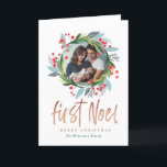 Merry Christmas | Watercolor Foliage Photo Wreath Holiday Card<br><div class="desc">Celebrate the magical and festive holiday season with our custom holiday greeting cards. Our festive holiday design features our hand painted holiday foliage, greenery, leaves and berry Christmas wreath artwork beautifully framing the photo to create a festive look. "first noel" displayed in a stylish script brush script in faux gold....</div>