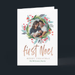 Merry Christmas | Watercolor Foliage Photo Wreath Holiday Card<br><div class="desc">Celebrate the magical and festive holiday season with our custom holiday greeting cards. Our festive holiday design features our hand painted holiday foliage, greenery, leaves and berry Christmas wreath artwork beautifully framing the photo to create a festive look. "first noel" displayed in a stylish script brush script in faux gold....</div>