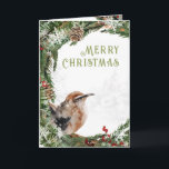 Merry Christmas Watercolor Nuthatch Nesting Bird Holiday Card<br><div class="desc">A Christmas holiday card featuring a watercolor painted holiday evergreen wreath with a red-breasted nuthatch perched on the wreath with large snowflakes and a winter white woodland background.</div>