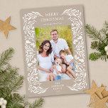 Merry Christmas White Winter Greenery Photo Holiday Card<br><div class="desc">A vertical photo Christmas card featuring an elegant white winter holiday greenery frame on a light tan background.</div>