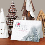 Merry Christmas Winter Foliage Watercolor Forest Holiday Card<br><div class="desc">Personalised Christmas Cards with elegant typography and simple elegance. This design has a watercolor forest in the snow with a subtle background of delicate leaves. "Wishing you a merry christmas and a happy new year" is lettered in handwritten script and elegant typography, decorated with a christmas poinsettia and winter greenery....</div>