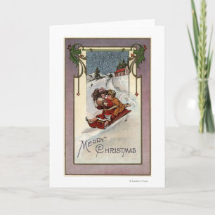 Merry ChristmasCouple Sledding Holiday Card