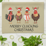 Merry Clucking Christmas - Four Santa Chickens Tea Towel<br><div class="desc">This cute chicken towel will have everyone laughing this Christmas. It features four chickens dressed in Santa Hats,  scarfs and Christmas lights. Below them it says Merry Clucking Christmas.</div>