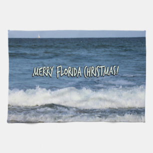 Merry Florida Christmas Over Ocean Blue Sky Tea Towel