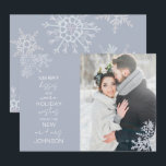 Merry Kisses Warm Wishes Snowflake Photo Holiday Card<br><div class="desc">Celebrate your first holiday season as newlyweds with our elegant Merry Kisses Warm Wishes Snowflake Photo Holiday Card Christmas card. Featuring a stunning wedding photo accented by delicate icy blue snowflakes, this card reads "merry kisses and warm holiday wishes from the new mr and mrs, " and is personalised with...</div>