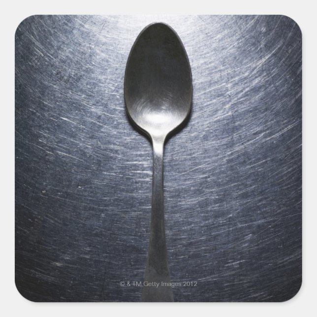 Metal spoon on stainless steel square sticker (Front)