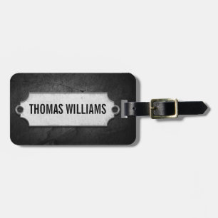 Metal Tag On Black Slate Rock