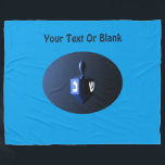 Metallic Blue Dreidel Fleece Blanket<br><div class="desc">A modernistic,  metallic blue dreidel against a dark,  night-like background.  Two of the Hebrew letters found on a dreidel,  nun and shin,  glow brightly.  Add your own text.</div>