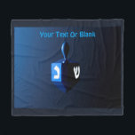 Metallic Blue Dreidel Fleece Blanket<br><div class="desc">A modernistic,  metallic blue dreidel against a dark,  night-like background.  Two of the Hebrew letters found on a dreidel,  nun and shin,  glow brightly.  Add your own text.</div>