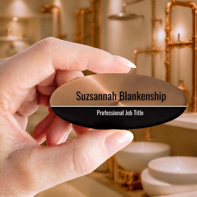 Metallic Professional Copper Flare Custom Name Tag (Faux copper and black oval template professional name tag  held between the thumb and index finger.)