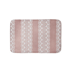 Metallic rose gold, off-white lace texture. bath mat