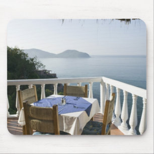Mexico, Guerrero, Zihuatanejo. Cafe Table over Mouse Mat