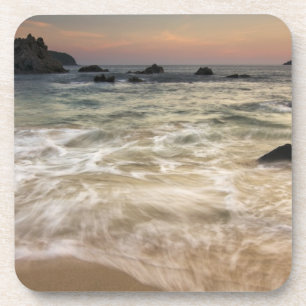 Mexico, Guerrero, Zihuatanejo. Surf along a Coaster