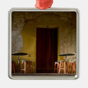 Mexico, Oaxaca, Afternoon sun lights balcony of Metal Tree Decoration