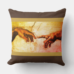 Michelangelo hands vintage art on brown cushion