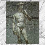 Michelangelo's Statue of David Jigsaw Puzzle<br><div class="desc">Statue of David (1501 to 1504) by Michelangelo is a vintage Renaissance Era fine art 17 ft. marble stone sculpture portrait of a man, the Biblical King David. Unlike previous depictions of David which portray the hero after his victory over Goliath, Michelangelo chose to represent David before the fight contemplating...</div>