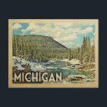 Michigan Vintage Travel Snowy Winter Nature Postcard<br><div class="desc">Michigan snowy winter scene featuring a river flowing through the mountains and a blue sky with puffy clouds. A lovely nature outdoors image for campers,  hikers and adventure seekers.</div>