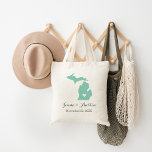 Michigan Wedding Welcome Tote Bag<br><div class="desc">Welcome out of town wedding guests with a bag full of snacks and treats personalised with the state where you're getting married and the bride and groom's names and wedding date. Click Customise It to move the heart to show any city or location on the state map. Use the design...</div>