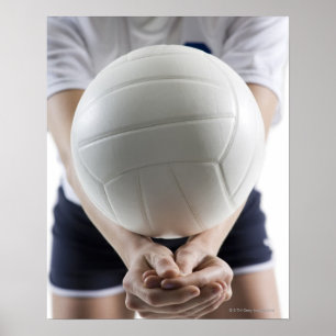 Mid section view of a young woman serving a poster