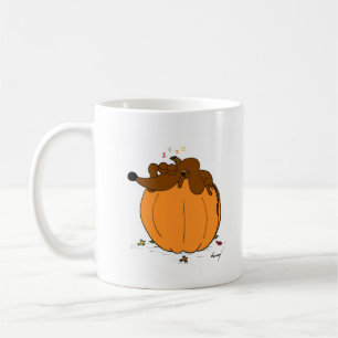 Midge Sleeping on a Pumpkin Mug