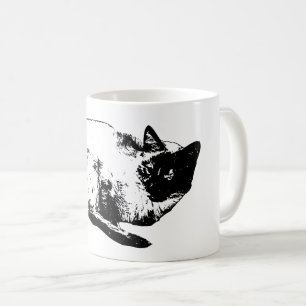 Midwinter cat in quiet poise coffee mug