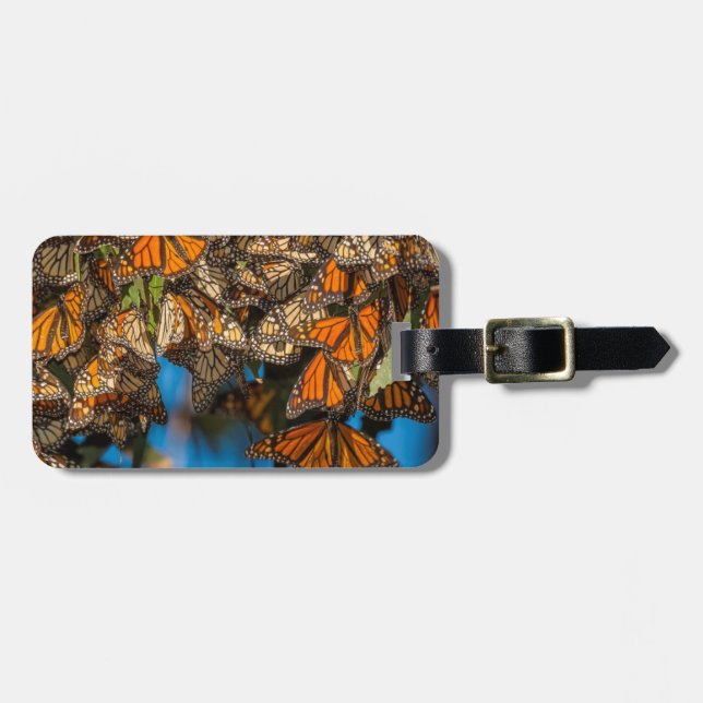 Migrating monarch butterflies cling to leaves luggage tag (Front Horizontal)