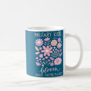 Military kid dandelion bloom where planted purple coffee mug