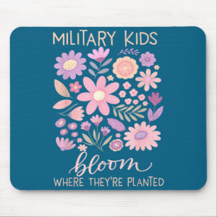 Military kid dandelion bloom where planted purple mouse mat