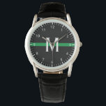 Military Thin Green Line Monogrammed Initial Watch<br><div class="desc">This watch features a thin green line design. It has a horizontal green stripe on a black background across the centre of the watch and a monogram initial in white typography for you to personalise. It also has white clock numbers and ticks for seconds and hours. Makes a unique personalise...</div>