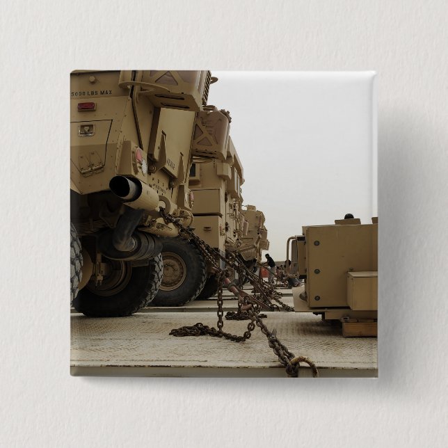 Military vehicles are locked down on semi truck 15 cm square badge (Front)