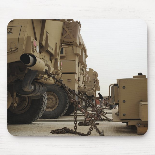 Military vehicles are locked down on semi truck mouse mat (Front)
