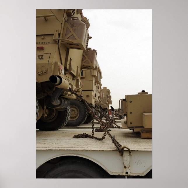 Military vehicles are locked down on semi truck poster (Front)