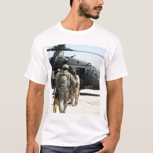 Military working dog handlers board a helicopte T-Shirt