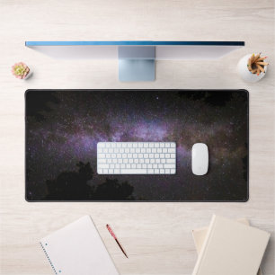 Milky way with trees silhouette desk mat