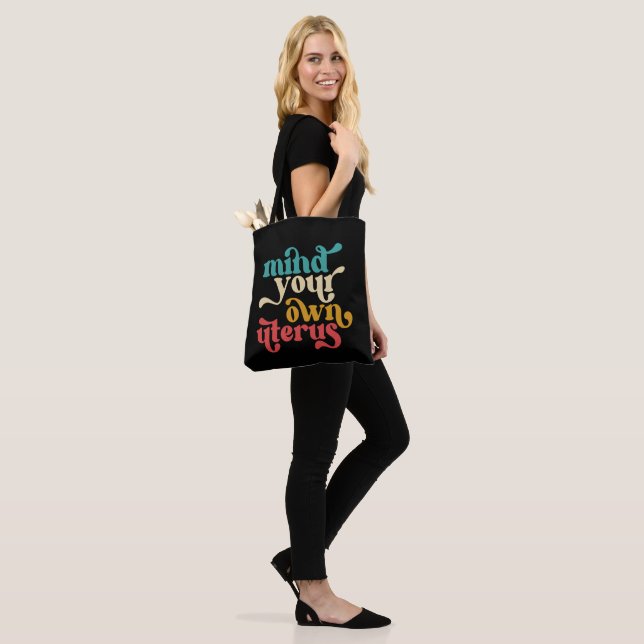 Mind Your Own Uterus Feminist Tote Bag (On Model)