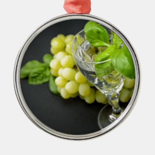 Mineral sparkling water with basil and grapes metal tree decoration